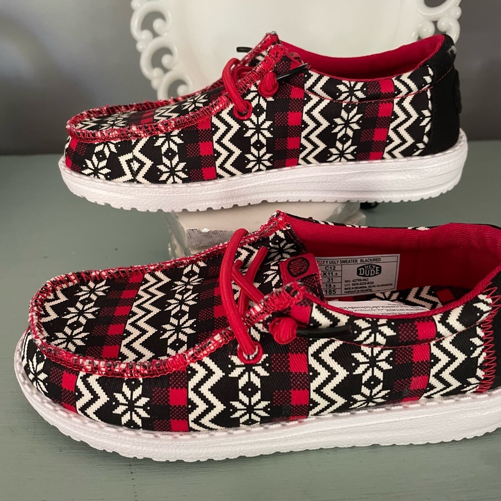 Hey Dudes Child’s Ugly sweater Plaid Kids Shoes with Red and Black Pattern.